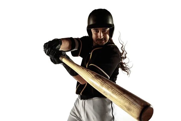 Jogador de beisebol, arremessador de uniforme preto praticando em um fundo branco . — Fotografia de Stock