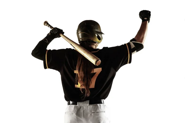 Jogador de beisebol, arremessador de uniforme preto praticando em um fundo branco . — Fotografia de Stock