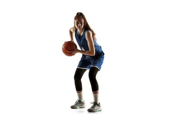 Young caucasian female basketball player against white studio background — Stock Photo, Image