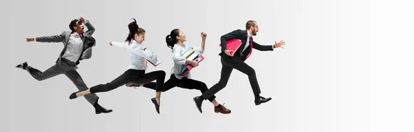 Office workers or ballet dancers jumping on white background — Stock Photo, Image
