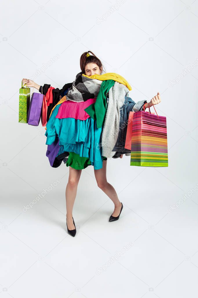 Woman addicted of sales and clothes, overproduction and crazy demand