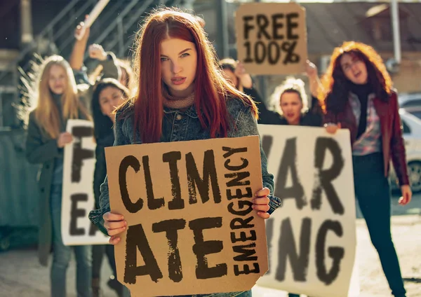 Young people protesting of climate emergency on the street