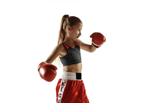 Young female kickboxing fighter training isolated on white background — Stock Photo, Image