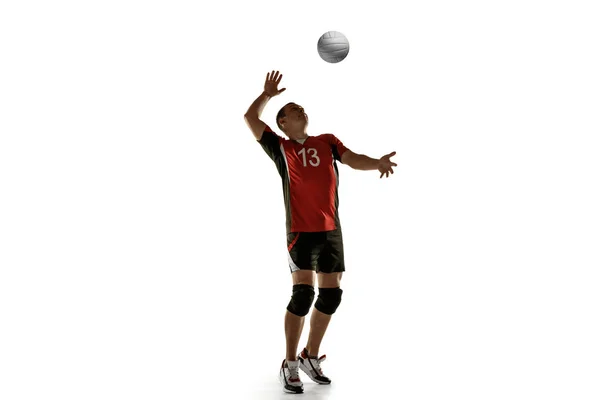 Young caucasian volleyball player placticing isolated on white background — Stock Photo, Image