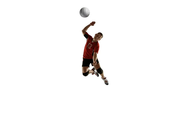 Young caucasian volleyball player placticing isolated on white background — Stock Photo, Image