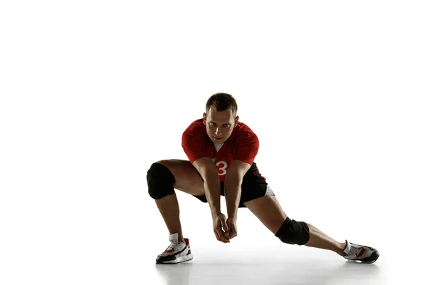 Young caucasian volleyball player placticing isolated on white background — Stock Photo, Image