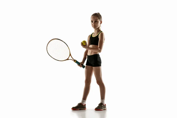 Little caucasian girl playing tennis isolated on white background — Stock Photo, Image