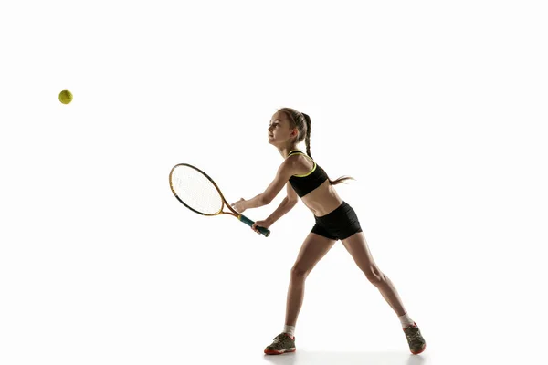 Little caucasian girl playing tennis isolated on white background — Stock Photo, Image