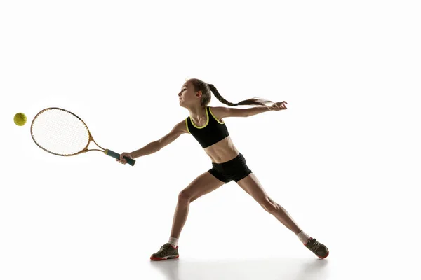 Little caucasian girl playing tennis isolated on white background — Stock Photo, Image