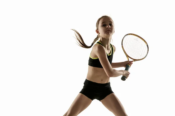 Little caucasian girl playing tennis isolated on white background — Stock Photo, Image