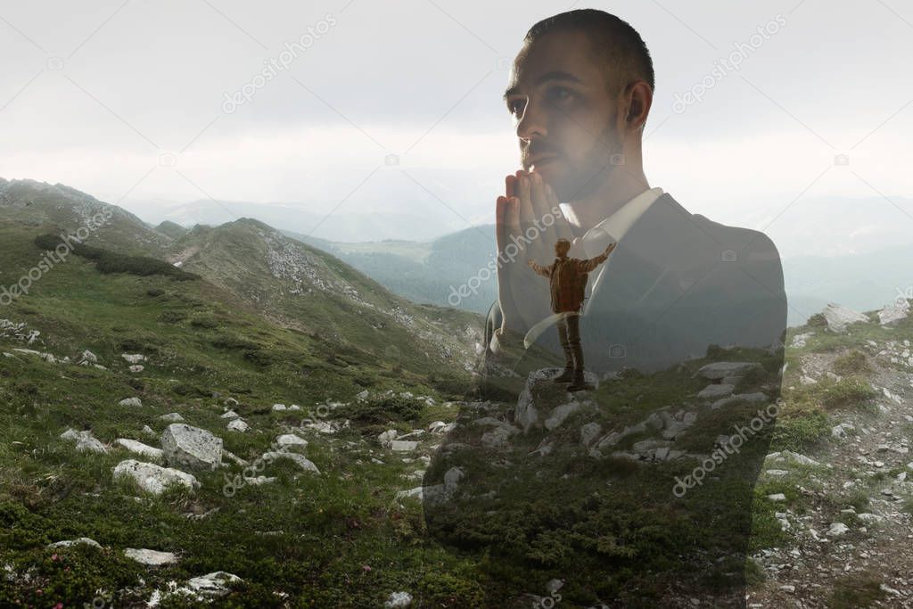 Silhouette of businessman with landscapes on background, double exposure.