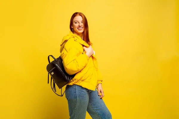 Caucasian womans portrait isolated on yellow studio background, follower be like — Stock Photo, Image