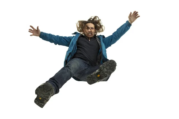 A second before falling - young man falling down with bright emotions and expression — Stock Photo, Image