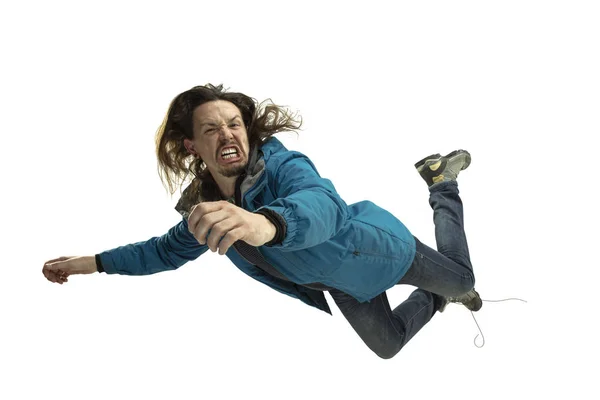 A second before falling - young man falling down with bright emotions and expression — Stock Photo, Image