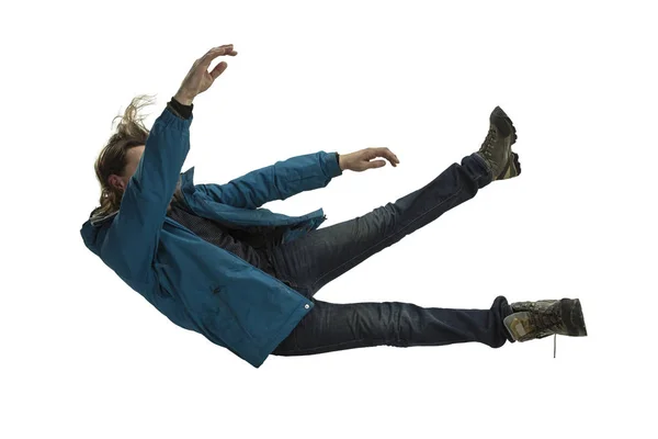 A second before falling - young man falling down with bright emotions and expression — Stock Photo, Image