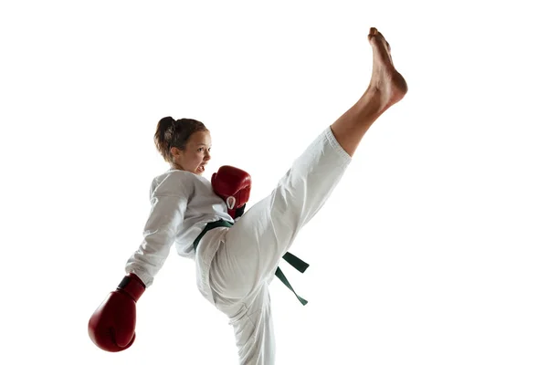 Confident junior in kimono practicing hand-to-hand combat, martial arts — Stock Photo, Image