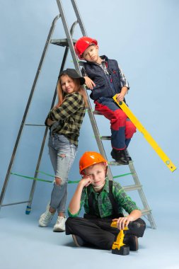 Kids dreaming about future profession of engineer