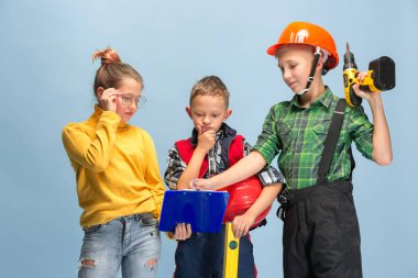 Kids dreaming about future profession of engineer