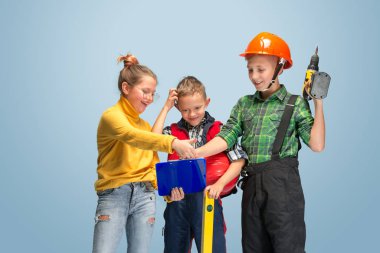 Kids dreaming about future profession of engineer