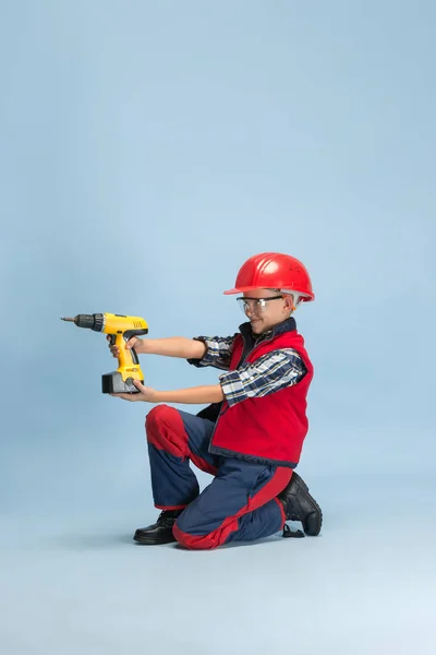 Boy dreaming about future profession of engineer — Stok fotoğraf