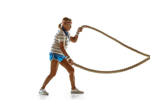 Senior szkolenia kobiet z lin w sporcie na białym tle — Zdjęcie stockowe