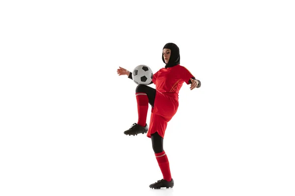 Arabian female soccer or football player isolated on white studio background — Stock Photo, Image