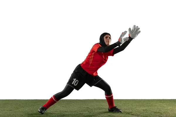 Arabian female soccer or football player, goalkeeper on white studio background — Stock Photo, Image