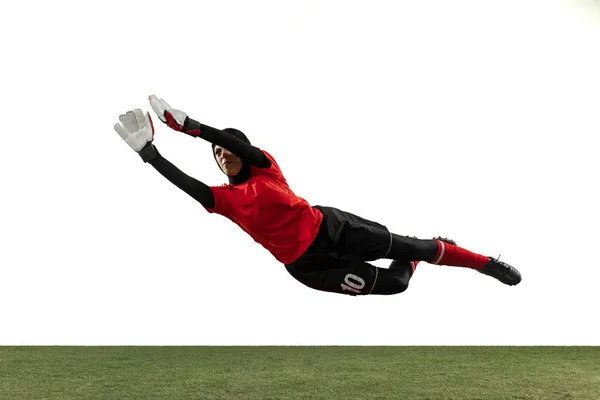 Arabian female soccer or football player, goalkeeper on white studio background — Stock Photo, Image