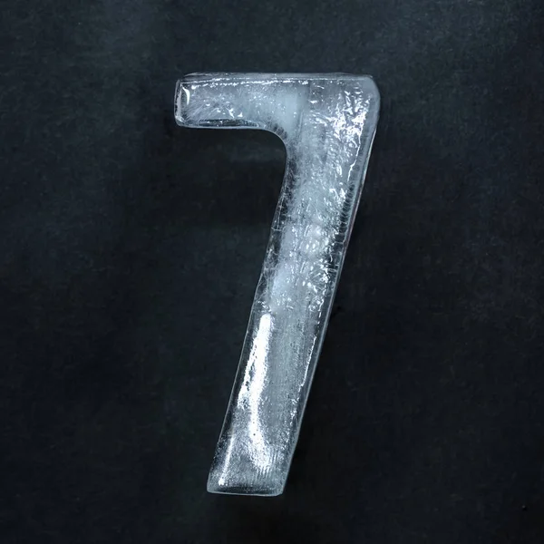 Numeric value, numbers made out of ice isolated on dark studio background — 스톡 사진