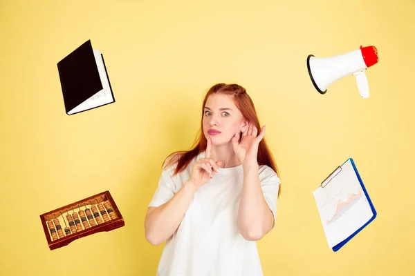 Caucasian young womans portrait on yellow background, too much tasks — 스톡 사진
