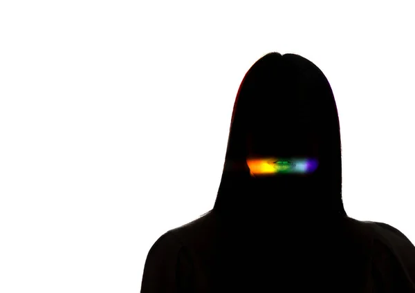 Dramatic portrait of a girl in the dark on white studio background with rainbow colored line — 스톡 사진