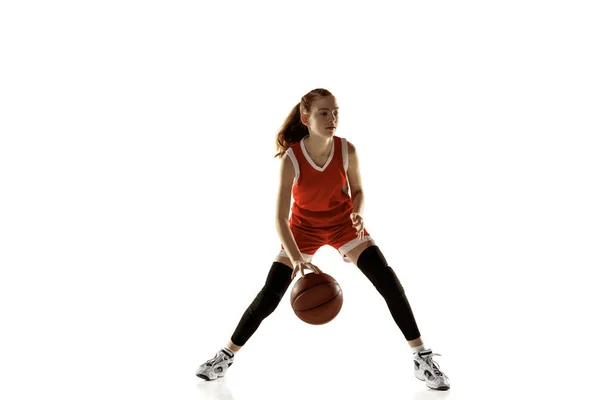 Young caucasian female basketball player against white studio background — Stock Photo, Image