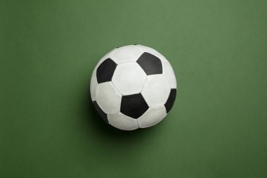 Sport equipment isolated on green studio background