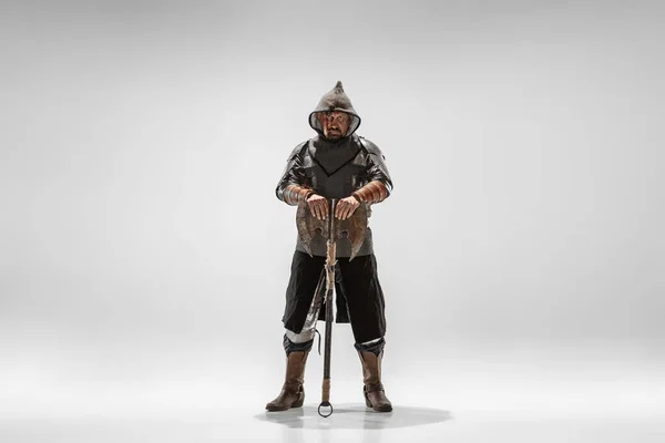 Brave armored knight fighting isolated on white studio background — Stock Photo, Image