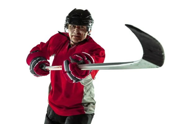 Male hockey player with the stick on ice court and white background — Stock Photo, Image