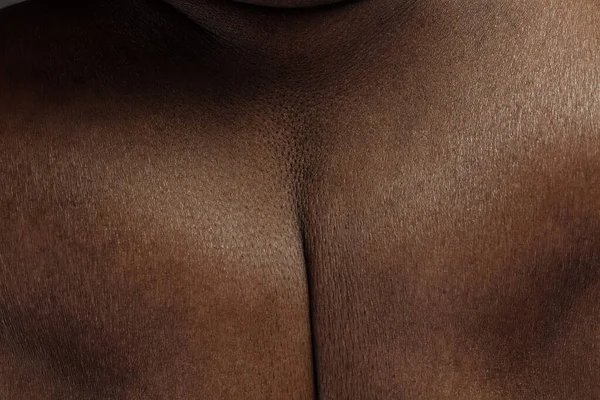 Texture of human skin. Close up of african-american male body — Stok fotoğraf