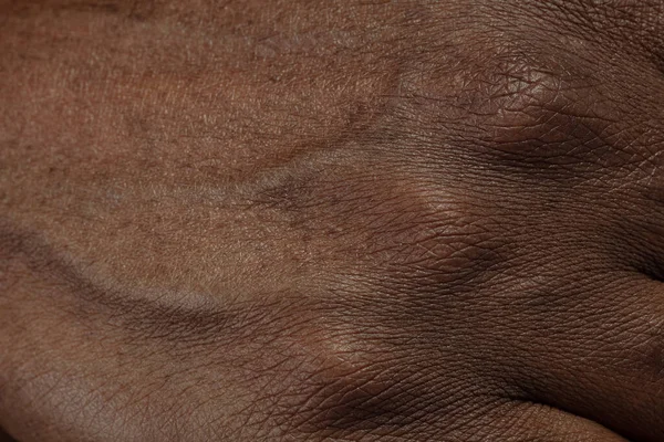 Texture of human skin. Close up of african-american male body — Stock Photo, Image