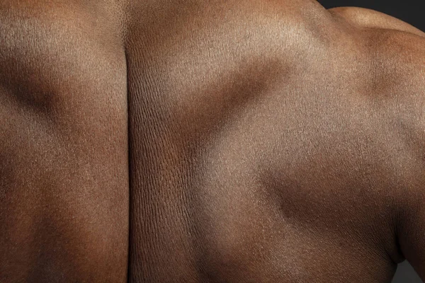 Texture of human skin. Close up of african-american male body — 图库照片