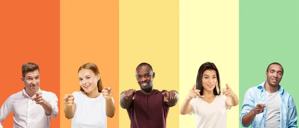 Portrait of group of emotional people on multicolored background — Stock Fotó