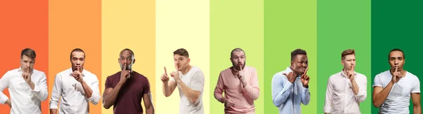 Portrait of group of emotional people on multicolored background — Stock Fotó