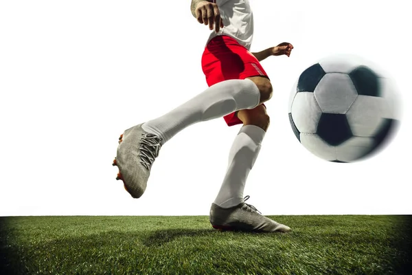 Fotboll eller fotbollsspelare på vit bakgrund - rörelse, handling, aktivitetskoncept — Stockfoto