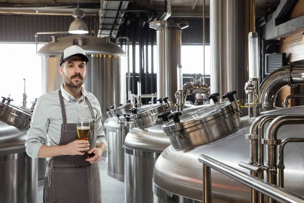 Professional brewer on his own craft alcohol production
