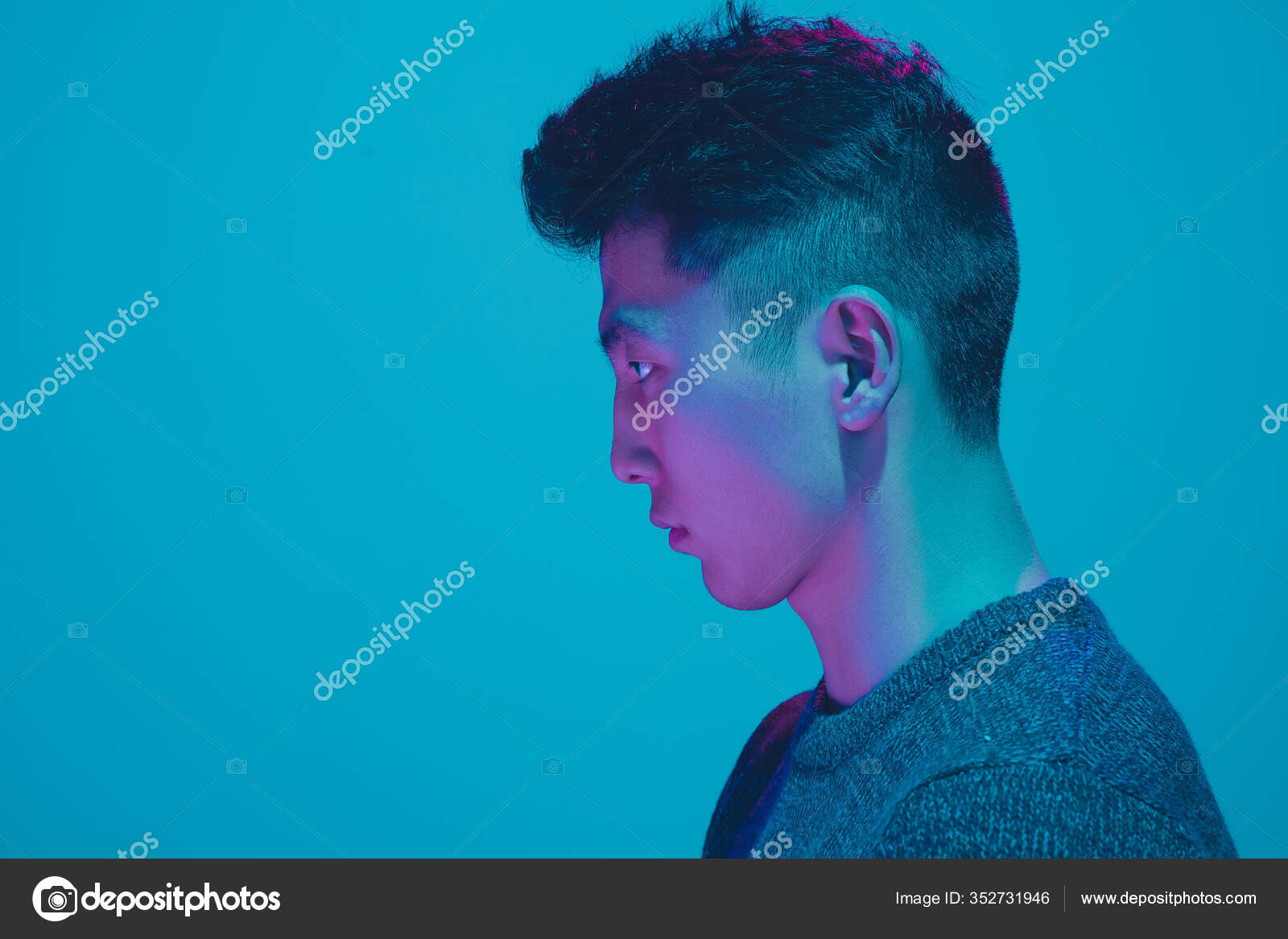 Portrait of a men in a futuristic cyberpunk style in neon clothes. A  high-tech man