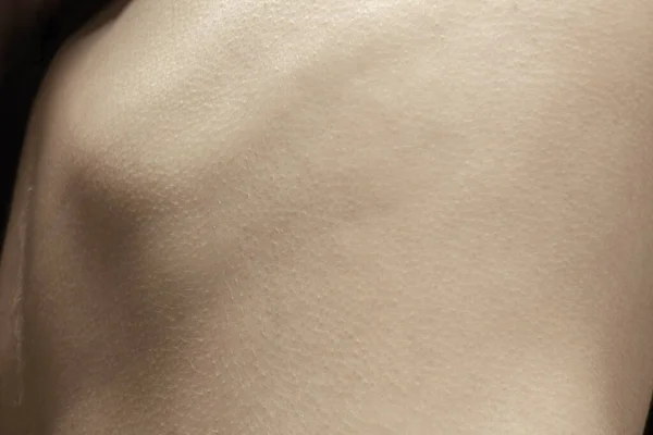 Struktura lidské kůže. Detailní záběr dobře udržovaného bílého lidského těla — Stock fotografie