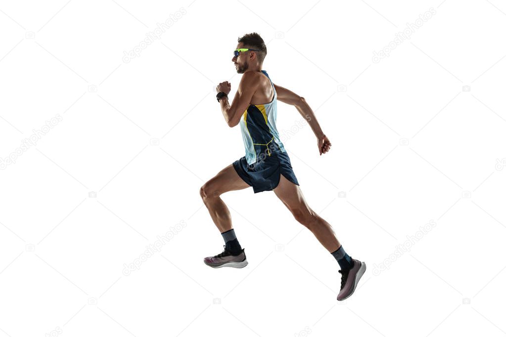 Triathlon male athlete running isolated on white studio background