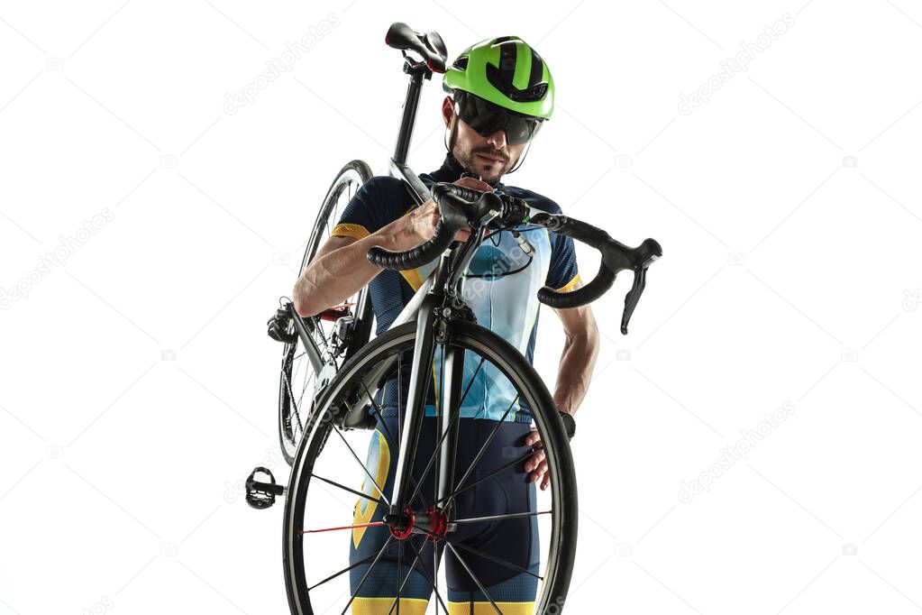 Triathlon male athlete cycle training isolated on white studio background