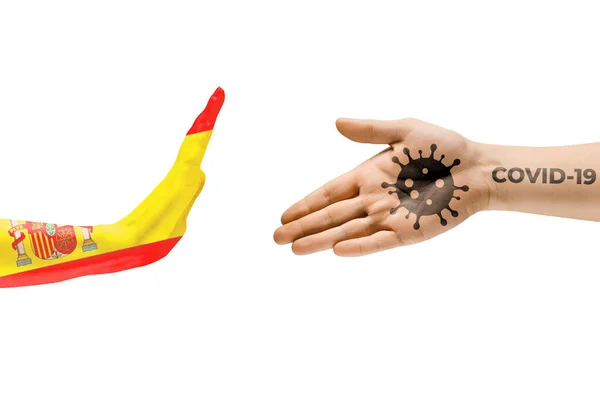 Sluta skaka hand. Mänskliga händer färgade i spanska flaggan och coronavirus - begreppet spridning av virus — Stockfoto