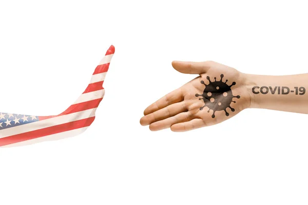 Припини потискати руки. Людські руки, забарвлені в прапор США і коронавірус - поняття розповсюдження вірусу — стокове фото
