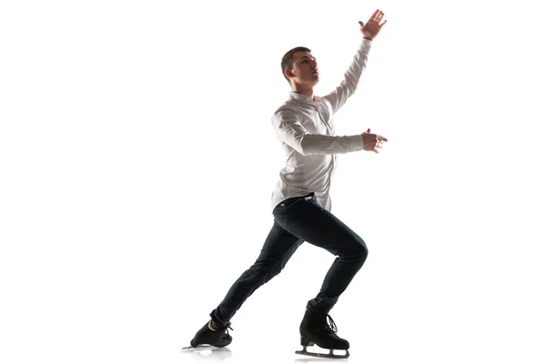 Man figure skating isolated on white studio backgound with copyspace — Stock Photo, Image