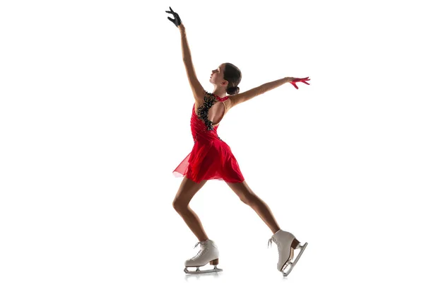 Girl figure skating isolated on white studio backgound with copyspace — Stock Photo, Image